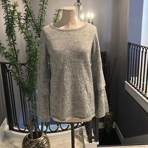 Cute sweater with distressed design and cute arms